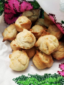 Gluten Free Vegan banana mini muffins wrapped in an embroidered napkin