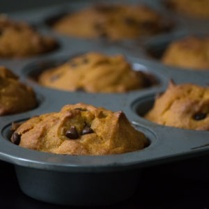 Pumpkin Spice Chocolate Chip Muffins in a pan